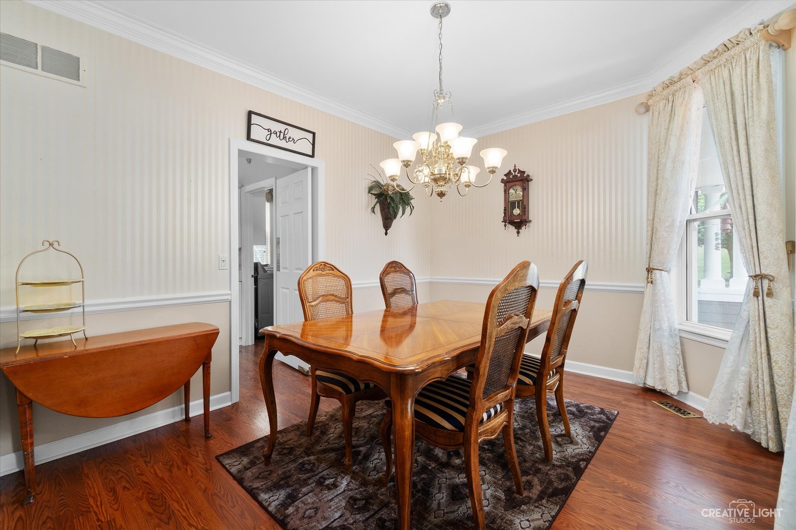 708 Viewpointe Drive St. Charles, IL 60174 - Photo 5 of 38 a view of a dining room with furniture and wooden floor