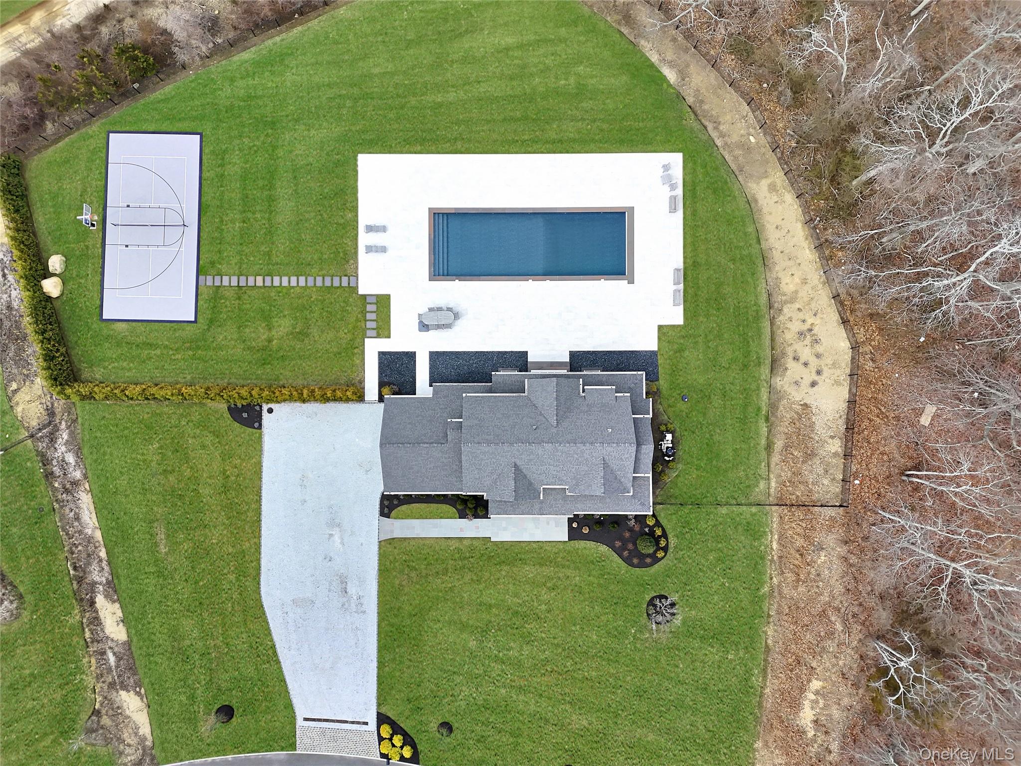 2790 Stanley Road Mattituck, NY 11952 - Photo 2 of 24 20 x 60 heated saltwater pool with auto cover