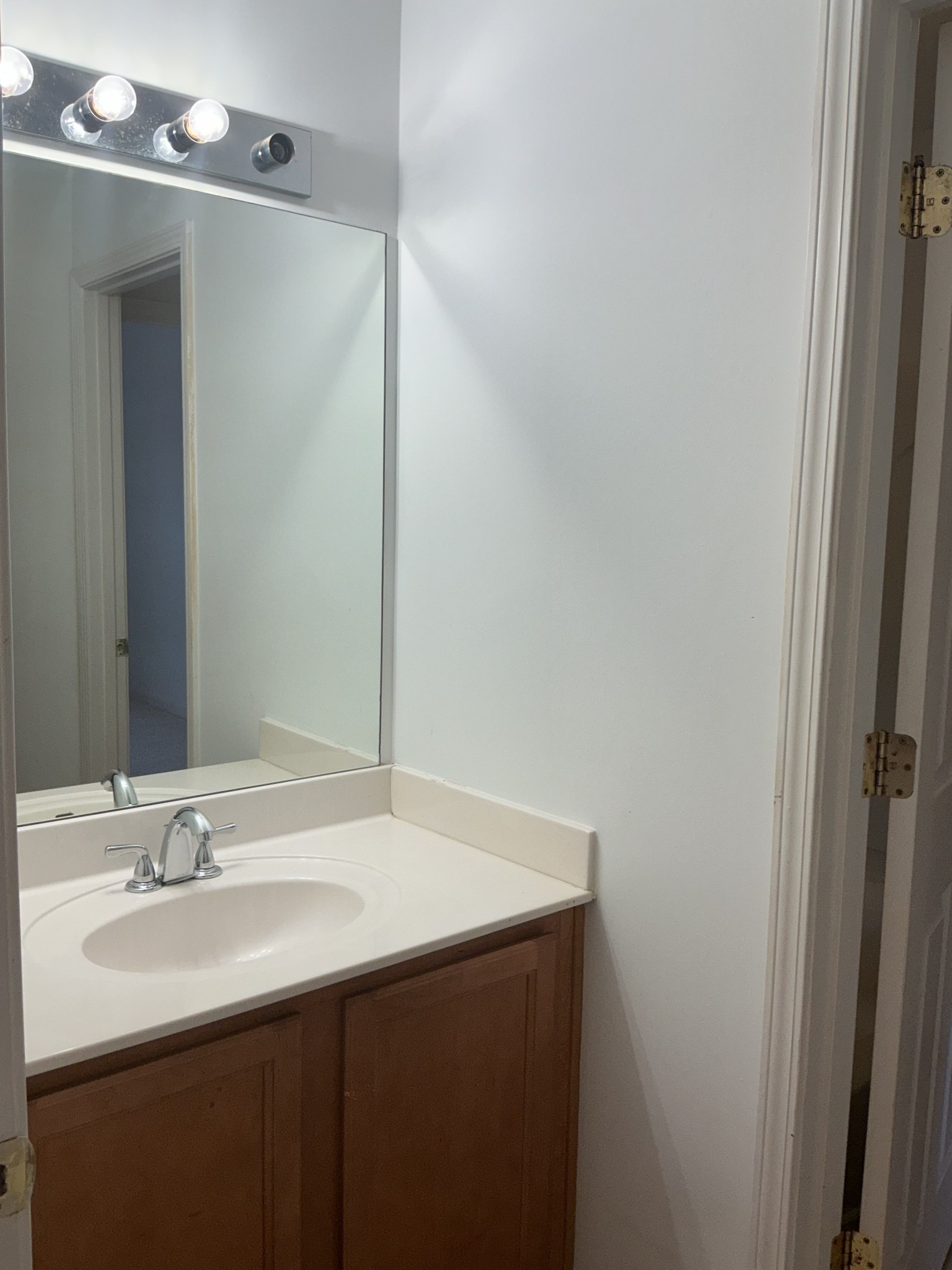 1101 Downs Boulevard, Unit J102 Franklin, TN 37064 - Photo 15 of 21 a bathroom with a sink and a mirror