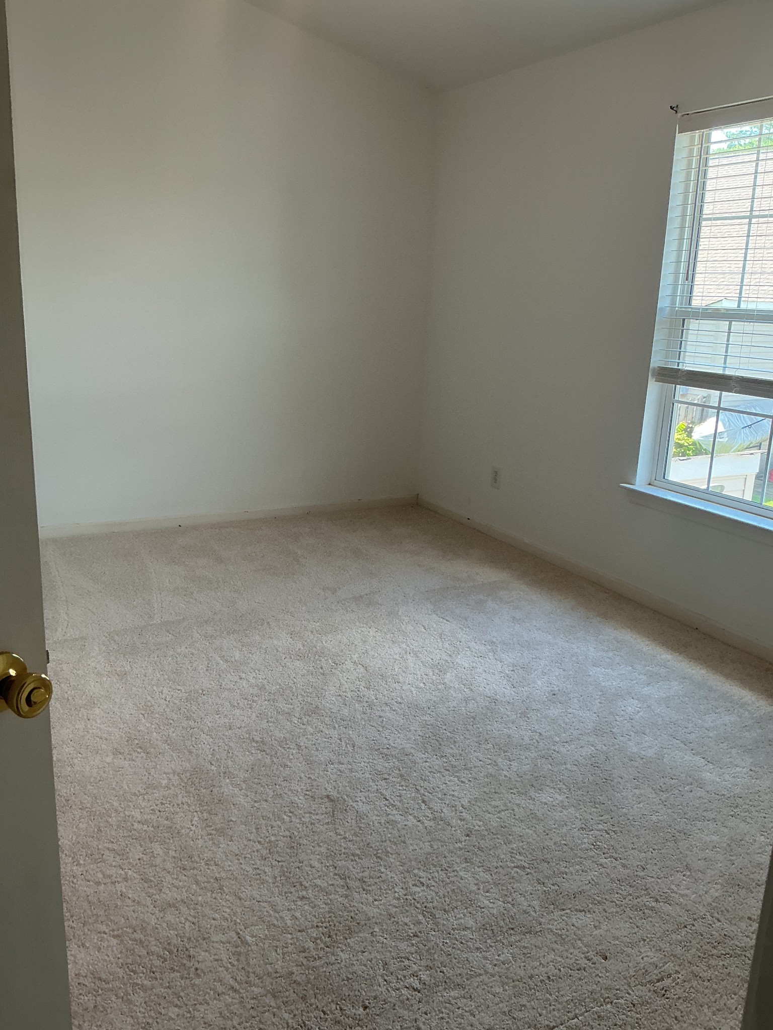 1101 Downs Boulevard, Unit J102 Franklin, TN 37064 - Photo 16 of 21 an empty room with a window
