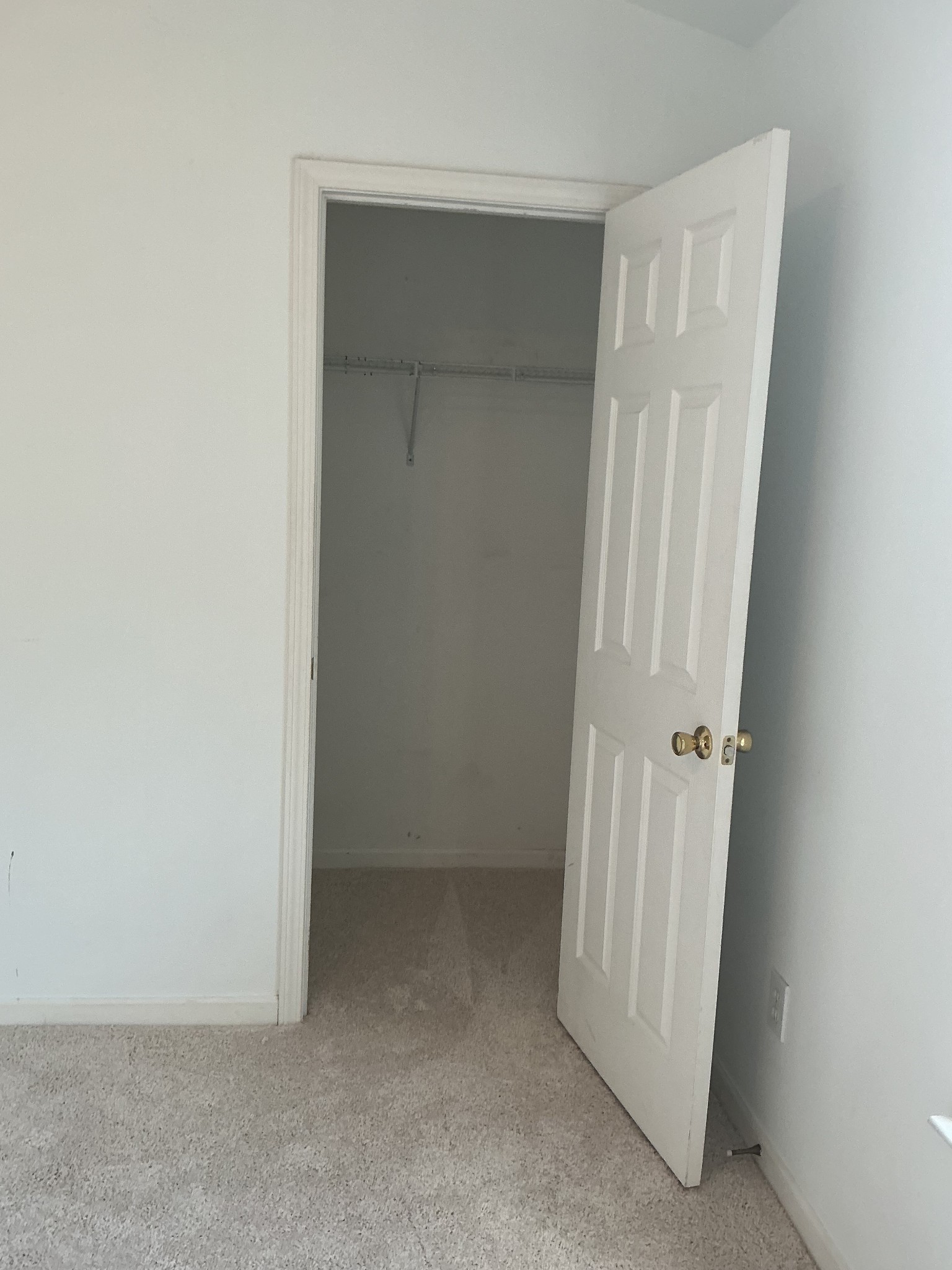 1101 Downs Boulevard, Unit J102 Franklin, TN 37064 - Photo 17 of 21 an empty room with a door