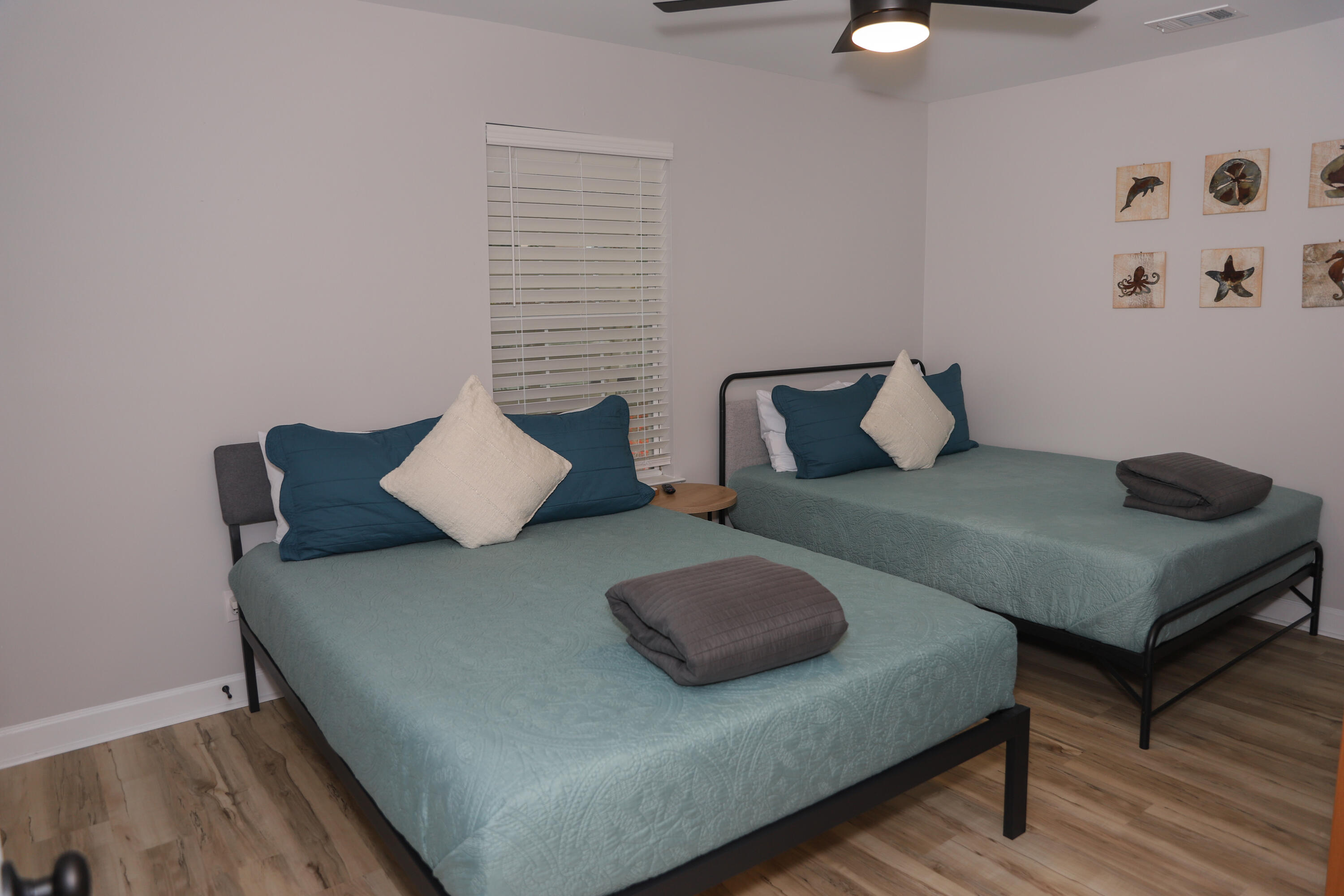 21924 Front Beach Road Panama City Beach, FL 32413 - Photo 101 of 120 a living room with furniture and a wooden floor
