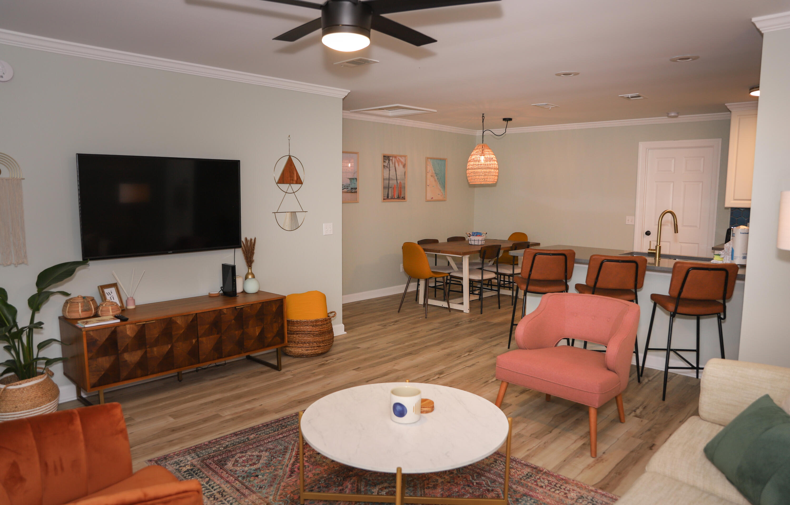 21924 Front Beach Road Panama City Beach, FL 32413 - Photo 105 of 120 a living room with furniture and a flat screen tv