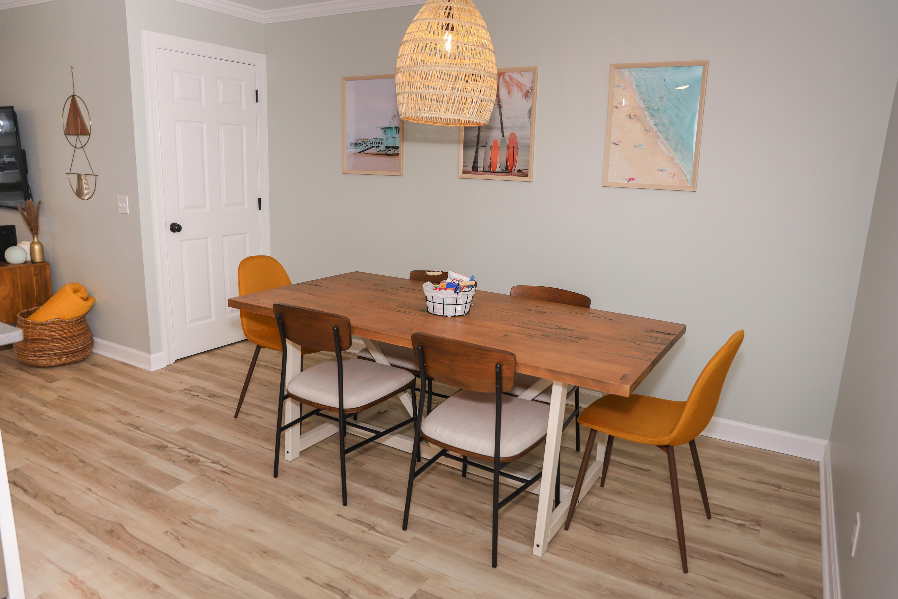 21924 Front Beach Road Panama City Beach, FL 32413 - Photo 108 of 120 a view of a dining room with furniture and wooden floor