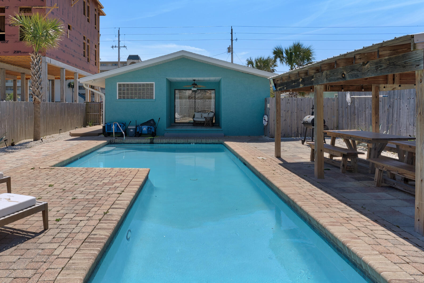 21924 Front Beach Road Panama City Beach, FL 32413 - Photo 24 of 120 a view of a house with backyard and sitting area