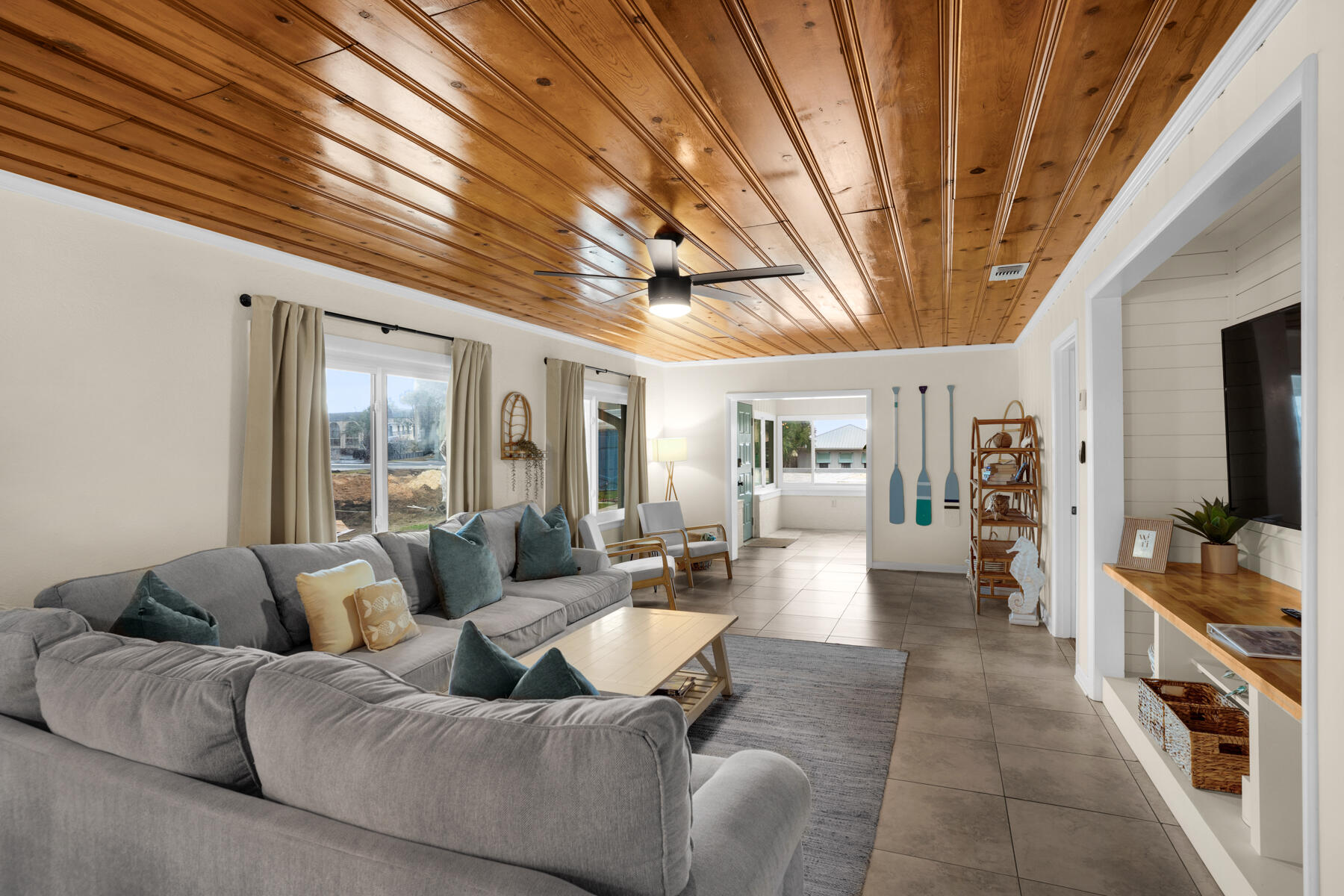 21924 Front Beach Road Panama City Beach, FL 32413 - Photo 37 of 120 a living room with furniture and a large window