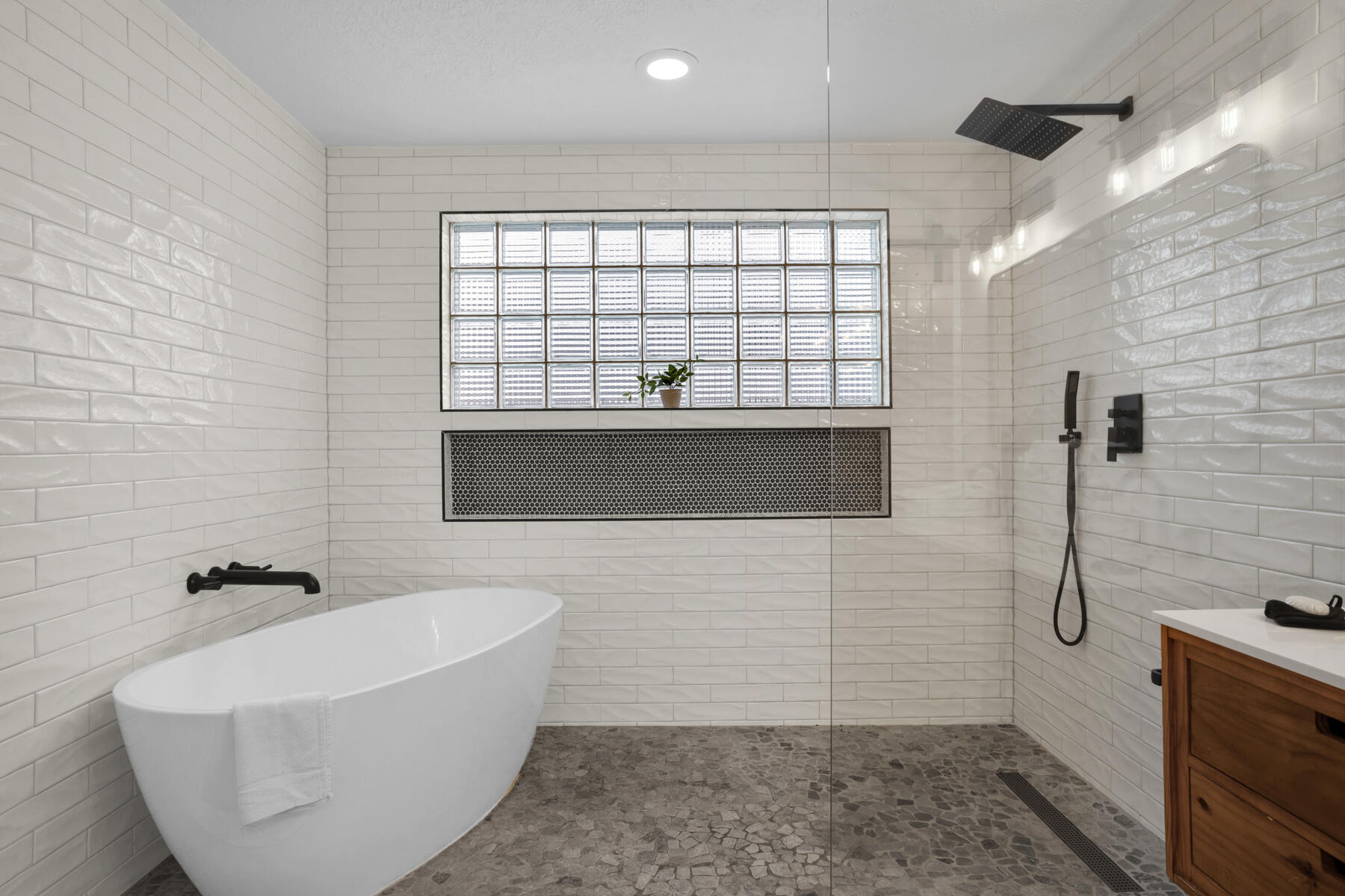 21924 Front Beach Road Panama City Beach, FL 32413 - Photo 67 of 120 a bathroom with a bathtub and a shower