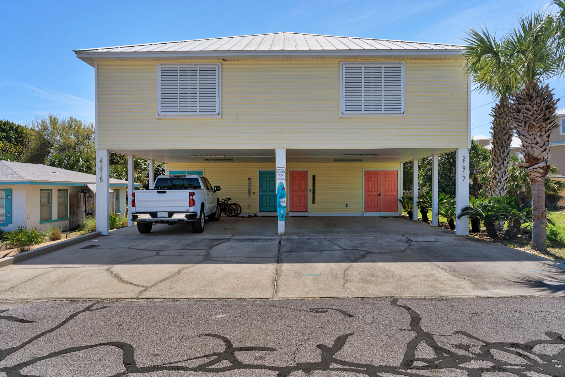 21924 Front Beach Road Panama City Beach, FL 32413 - Photo 69 of 120 a car parked in front of a house