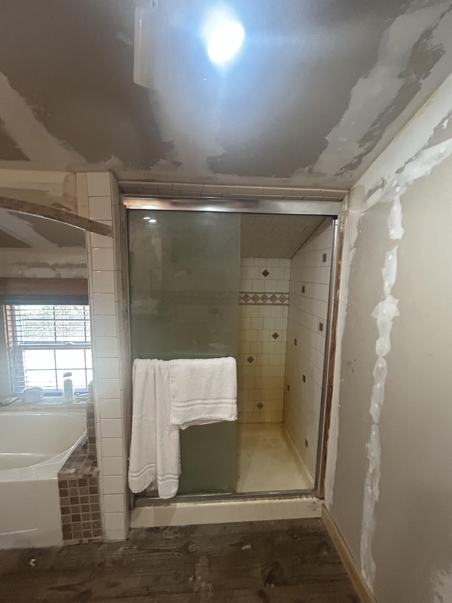 4810 Windmill Road Loxahatchee, FL 33470 - Photo 26 of 34 a bathroom with a shower