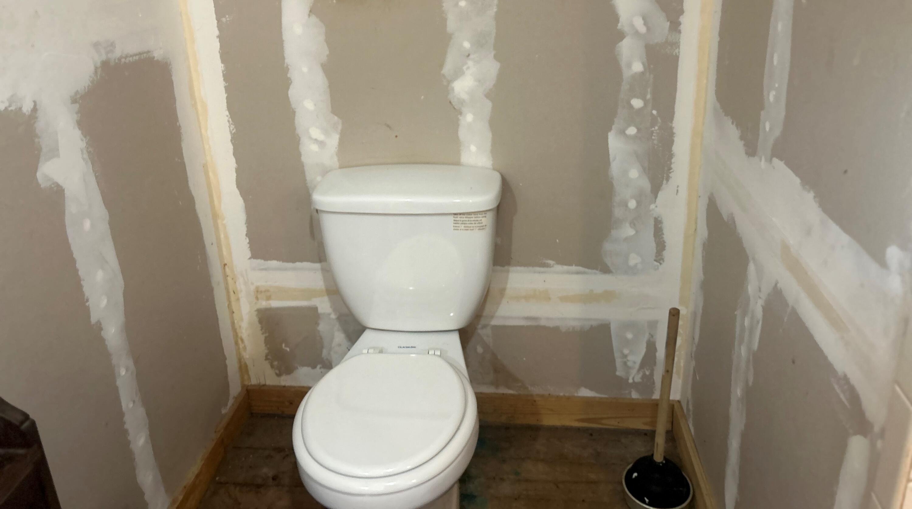 4810 Windmill Road Loxahatchee, FL 33470 - Photo 28 of 34 a bathroom with a toilet and a shower