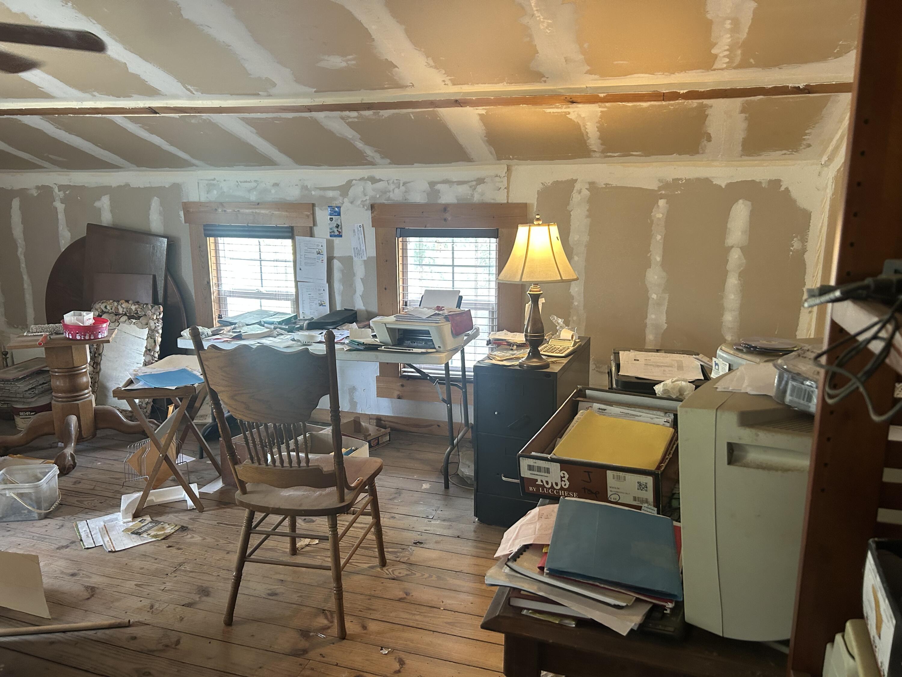 4810 Windmill Road Loxahatchee, FL 33470 - Photo 34 of 34 a room with furniture and a window