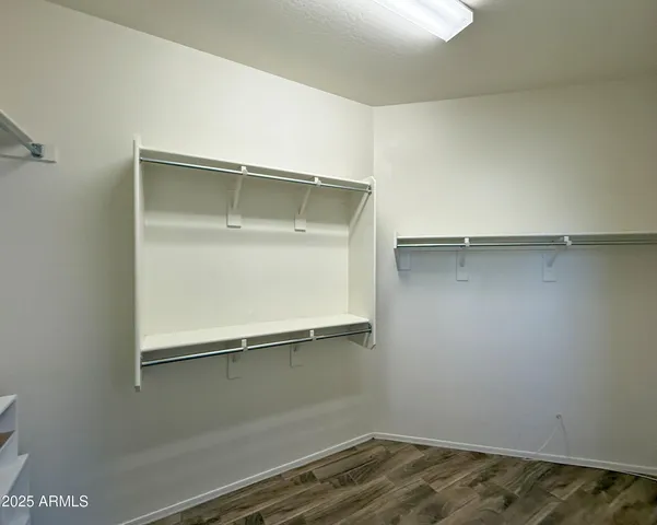 an empty room with a bench