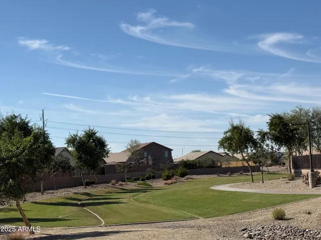 a view of a garden with houses