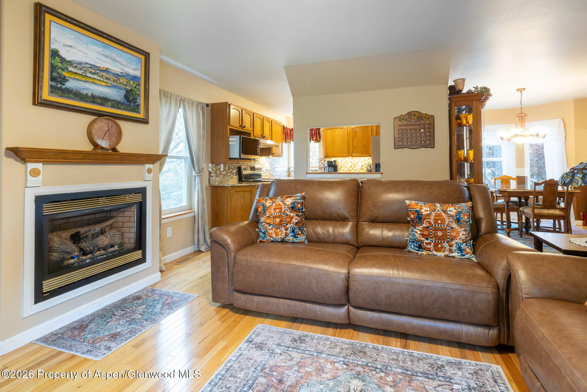 1335 Firethorn Drive Rifle, CO 81650 - Photo 12 of 30 a living room with furniture and a fireplace