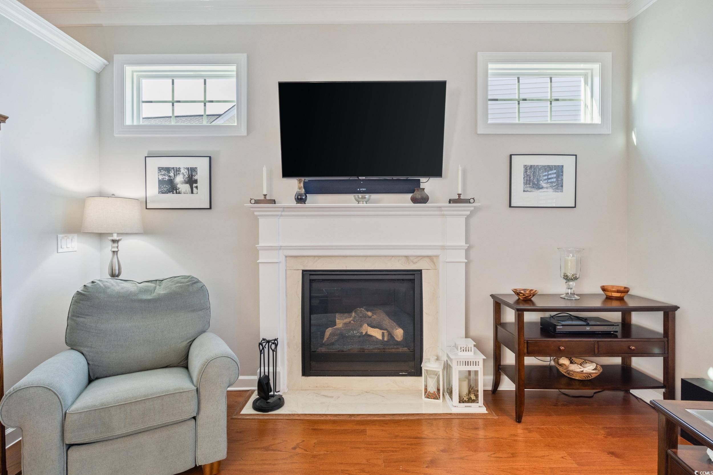 858 Edgewater Drive Murrells Inlet, SC 29576 - Photo 3 of 39 Living area featuring a high end fireplace, crown