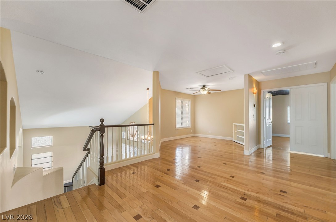 271 Pointe Ranier Avenue Henderson, NV 89012 - Photo 10 of 26 This bright and open loft area features beautiful hardwood flooring and ample natural light.