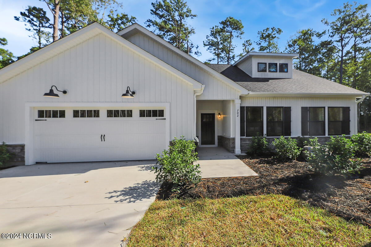 702 Boundary Loop Road Northwest Calabash, NC 28467 - Photo 3 of 23 702 front 3
