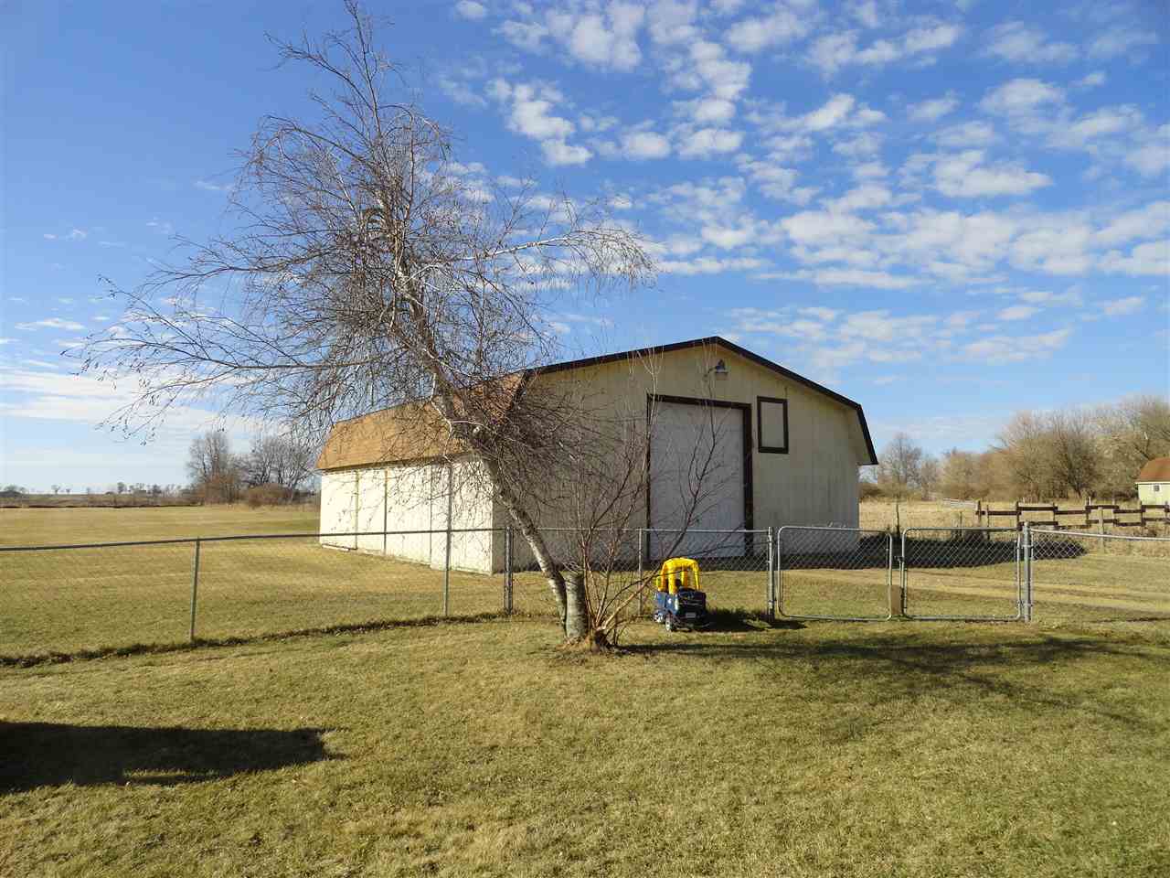 5375 Baxter Road Rockford, IL 61109 - Photo 11 of 14 a house with swimming pool in front of it
