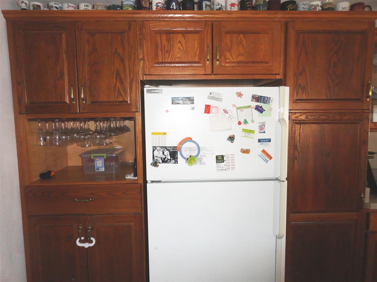 5375 Baxter Road Rockford, IL 61109 - Photo 12 of 14 a white refrigerator freezer sitting inside of a kitchen