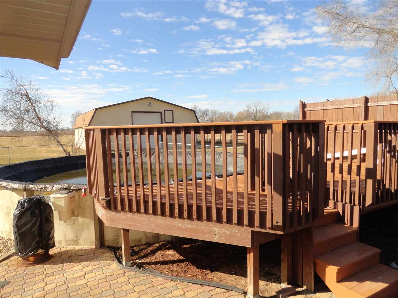 5375 Baxter Road Rockford, IL 61109 - Photo 7 of 14 a view of a chair and table in the patio