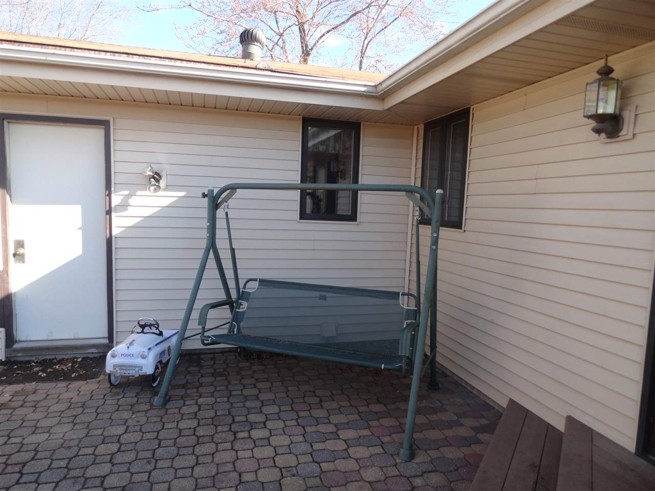 5375 Baxter Road Rockford, IL 61109 - Photo 8 of 14 a view of entryway with wooden stairs