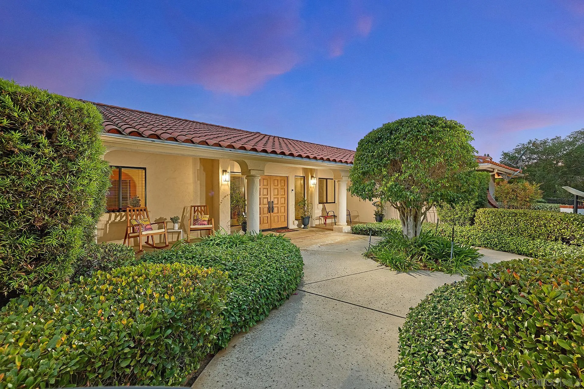 3064 Live Oak Park Road Fallbrook, CA 92028 - Photo 3 of 74 a front view of a house with a yard