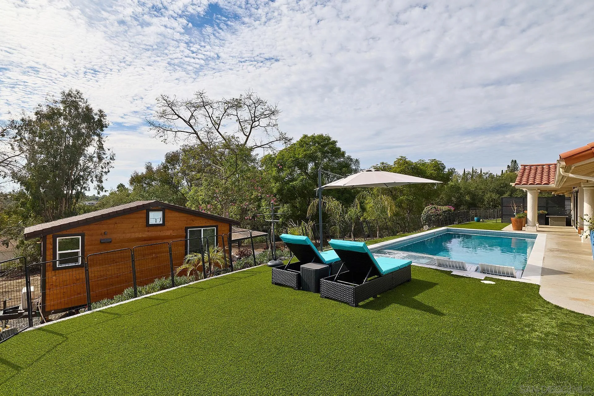 3064 Live Oak Park Road Fallbrook, CA 92028 - Photo 51 of 74 a view of a house with backyard and sitting area