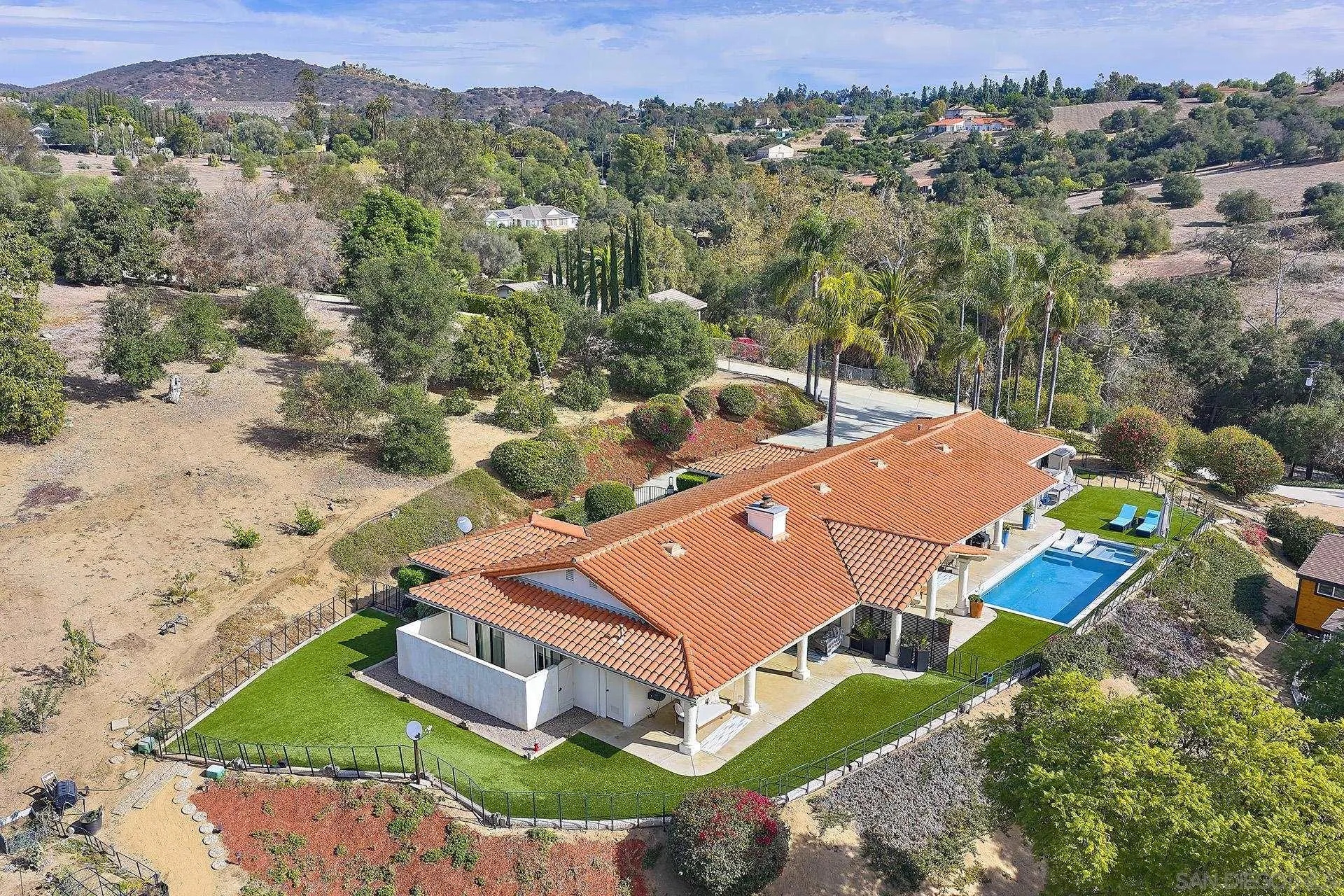 3064 Live Oak Park Road Fallbrook, CA 92028 - Photo 64 of 74 an aerial view of a house with a mountain