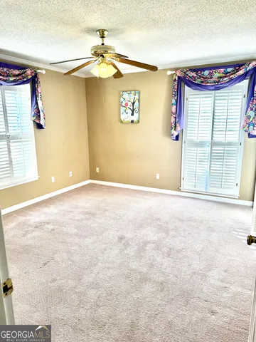 a view of a livingroom with a staircase