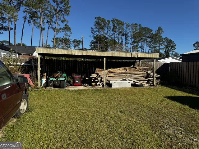 a house with swimming pool in front of it