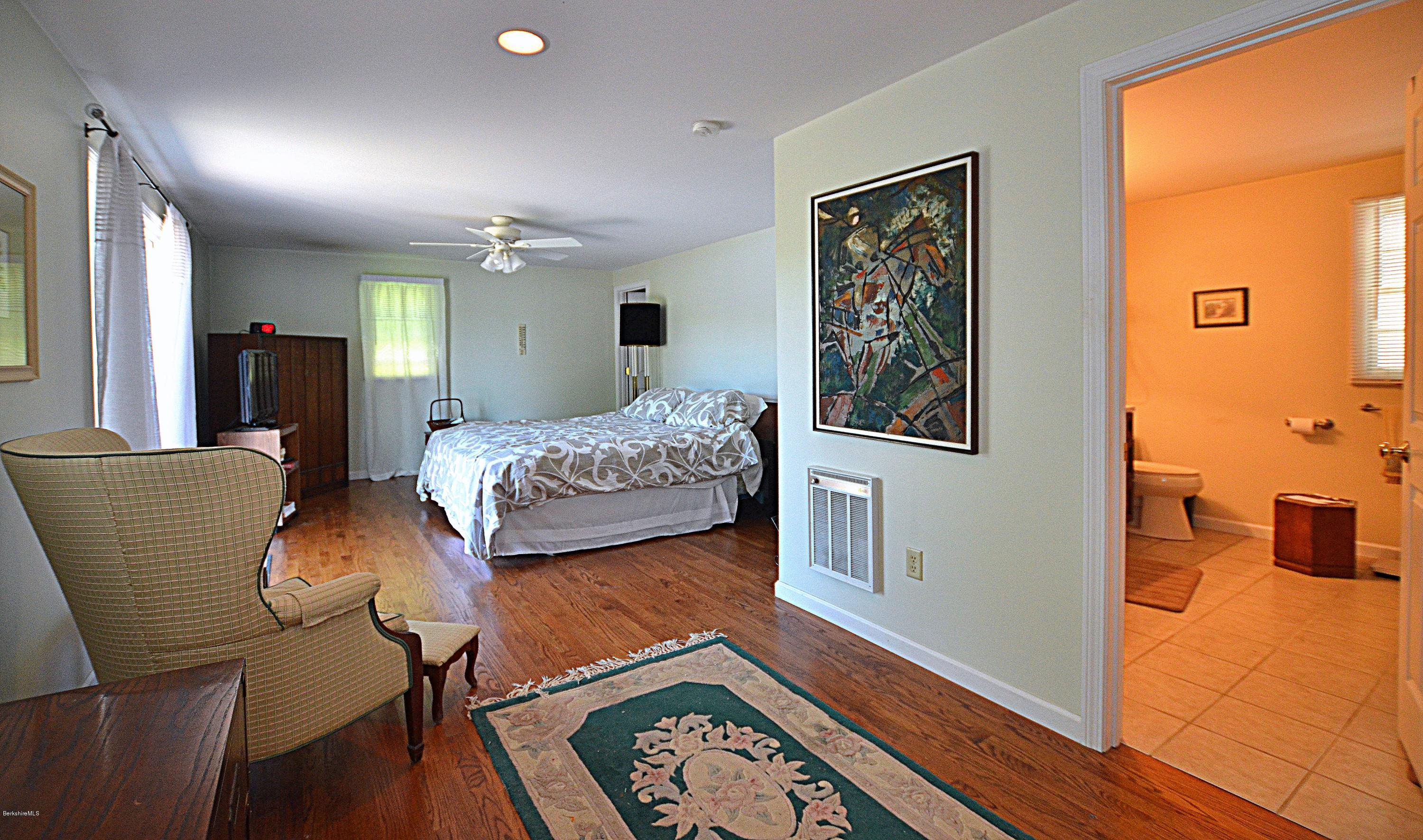 1381 East Otis Road Otis, MA 01029 - Photo 19 of 48 a living room with furniture and a table