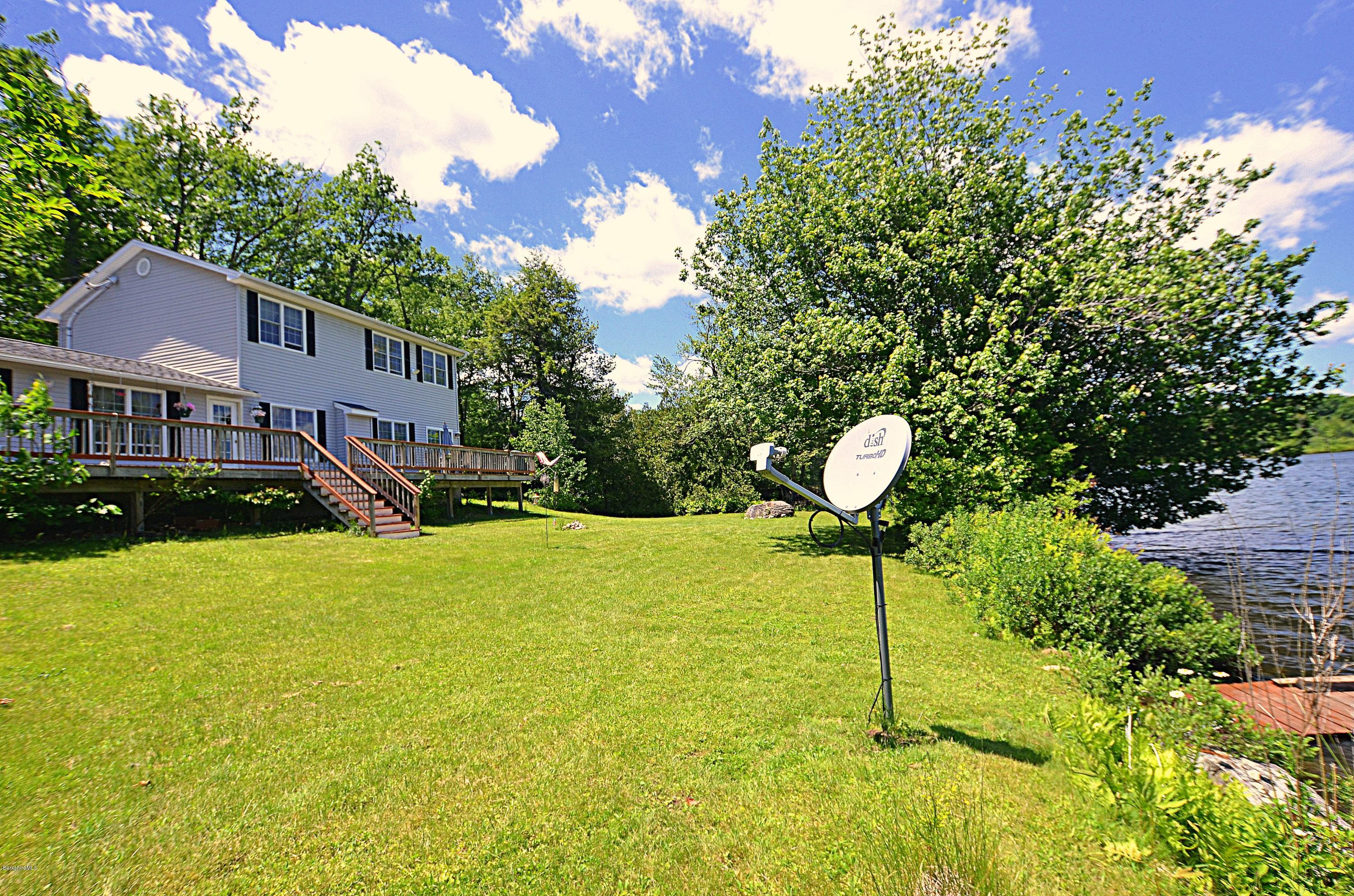 1381 East Otis Road Otis, MA 01029 - Photo 3 of 48 a house view with a garden space