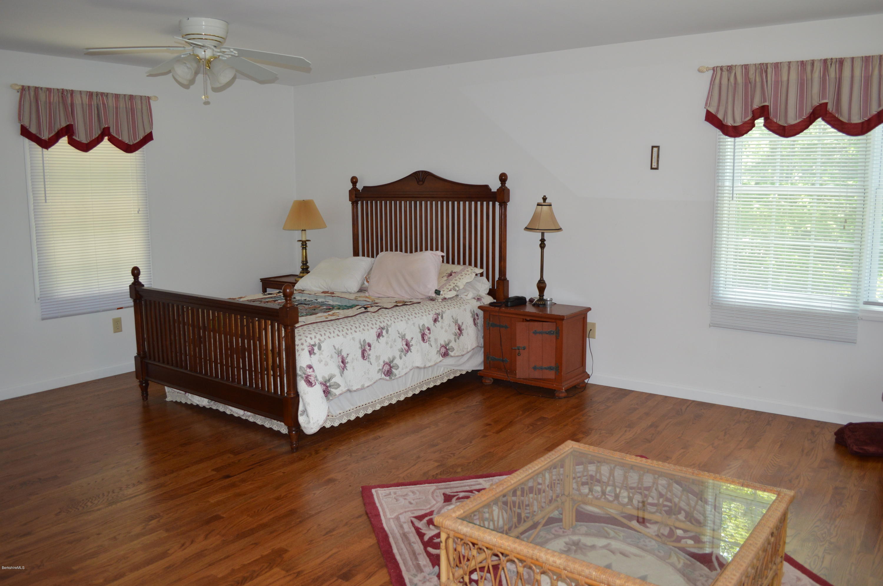 1381 East Otis Road Otis, MA 01029 - Photo 29 of 48 a bedroom with a bed and a window