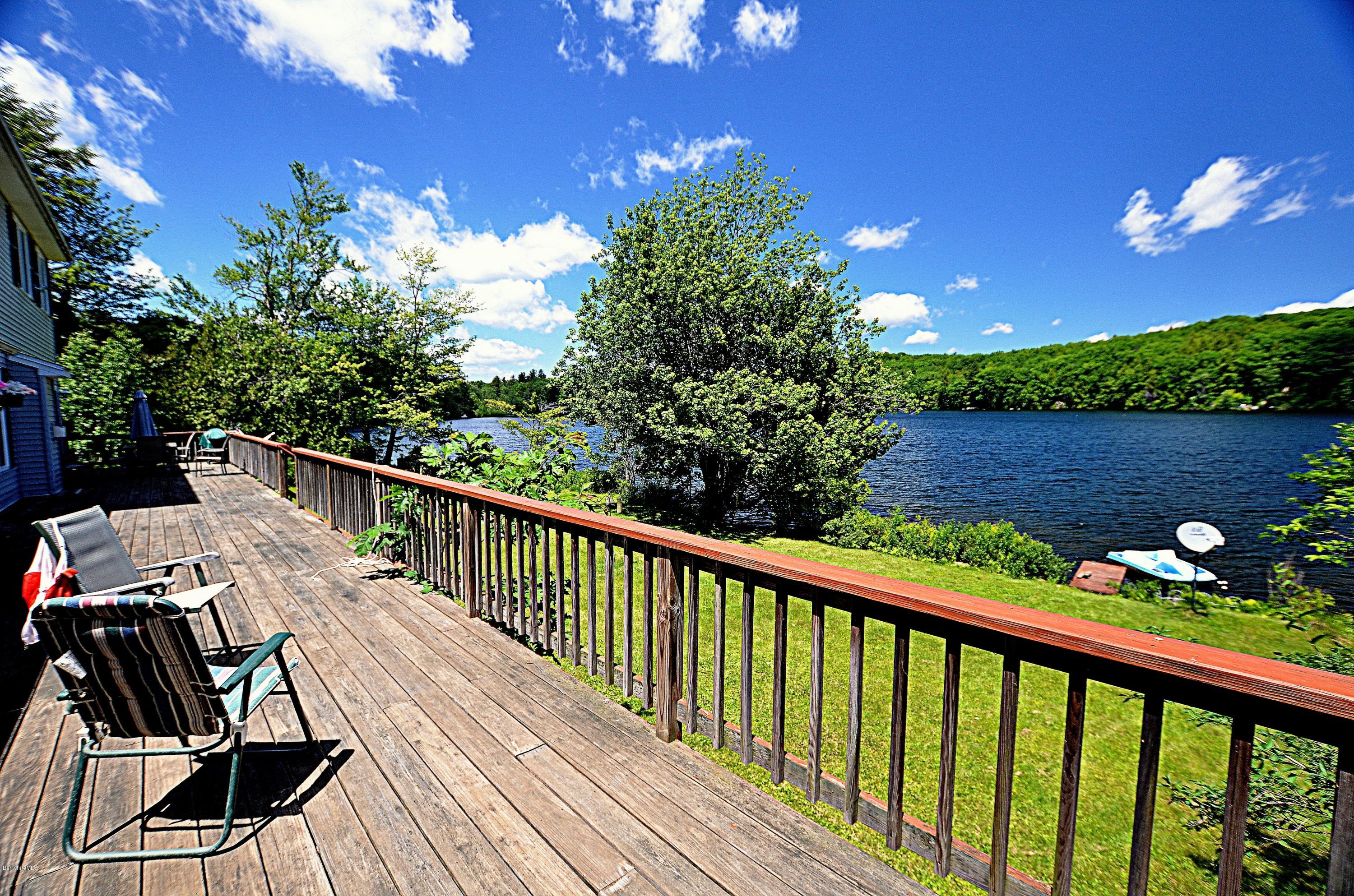 1381 East Otis Road Otis, MA 01029 - Photo 4 of 48 a view of a balcony with wooden floor and outdoor space