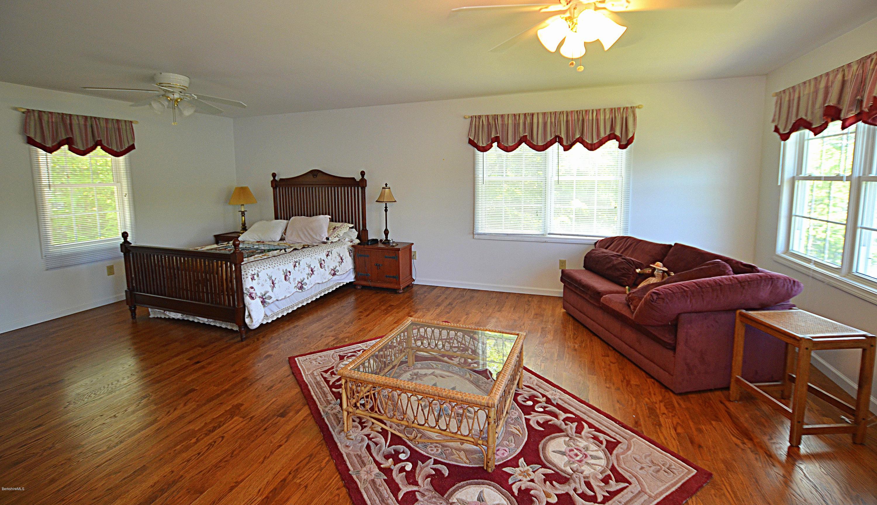 1381 East Otis Road Otis, MA 01029 - Photo 31 of 48 a living room with furniture and a window