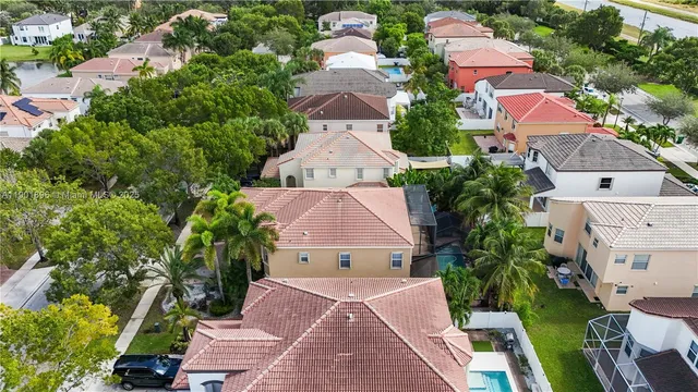 an aerial view of a house with a garden