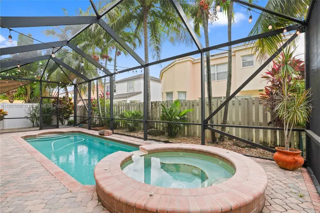 a view of outdoor space with swimming pool