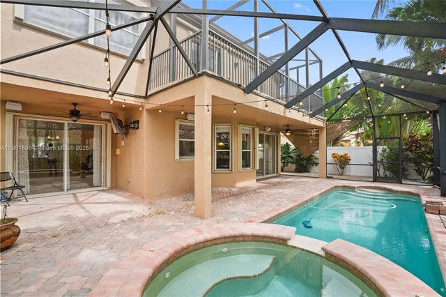 a view of a house with a swimming pool