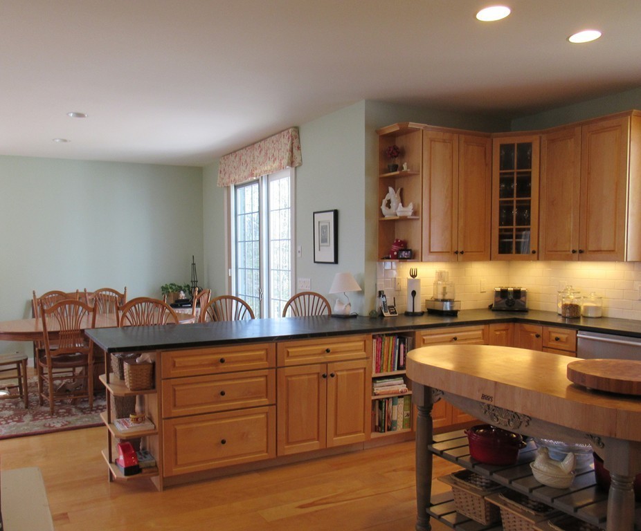 124 Turkey Hill Road Northampton, MA 01062 - Photo 12 of 30 a kitchen with stainless steel appliances granite countertop a stove a sink and a refrigerator