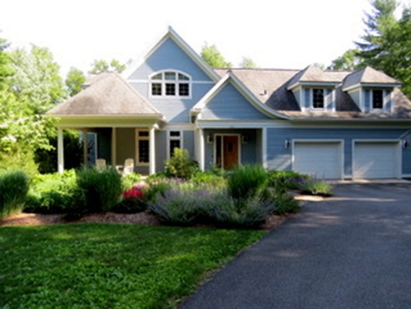 124 Turkey Hill Road Northampton, MA 01062 - Photo 2 of 30 a front view of a house with a yard and trees