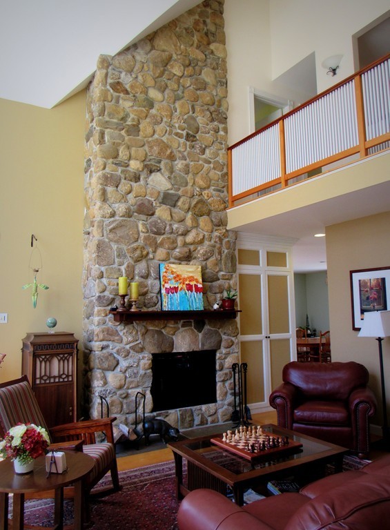 124 Turkey Hill Road Northampton, MA 01062 - Photo 10 of 30 a living room with furniture and a fireplace