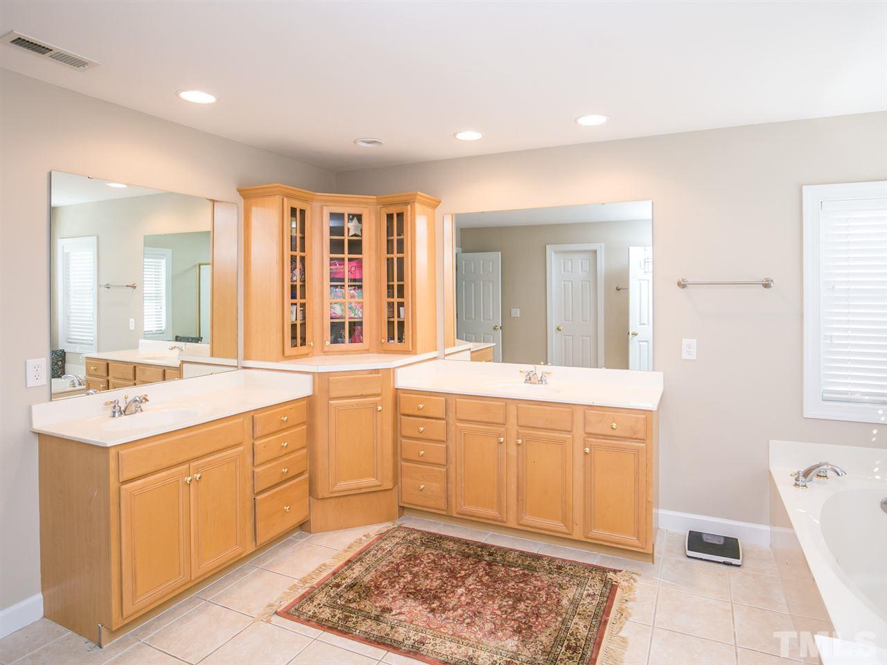 12416 Mayhurst Place Raleigh, NC 27614 - Photo 12 of 25 Dual Vanities with Plenty of Cabinet Space