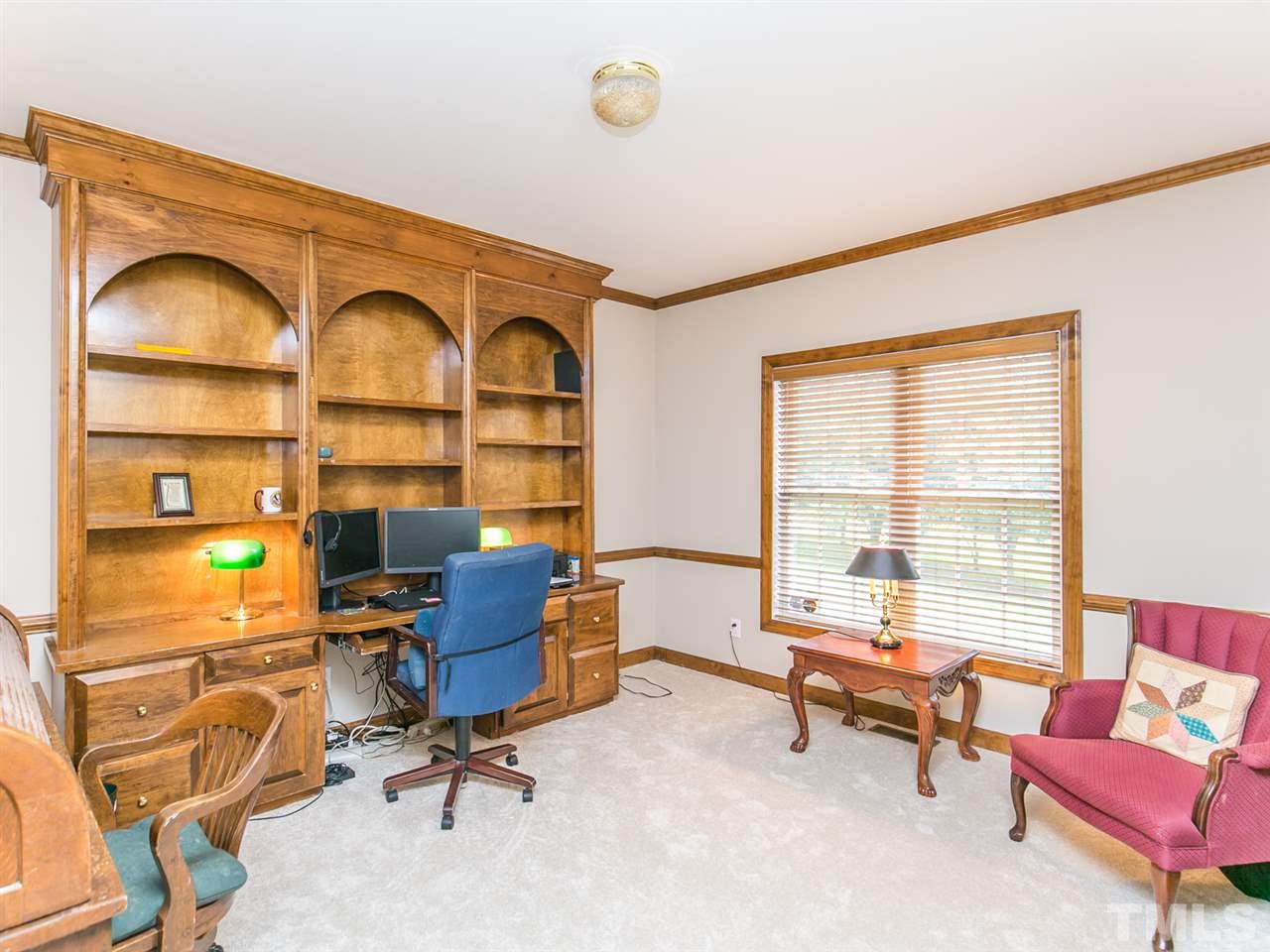 12416 Mayhurst Place Raleigh, NC 27614 - Photo 4 of 25 Built in Desk and Bookcases