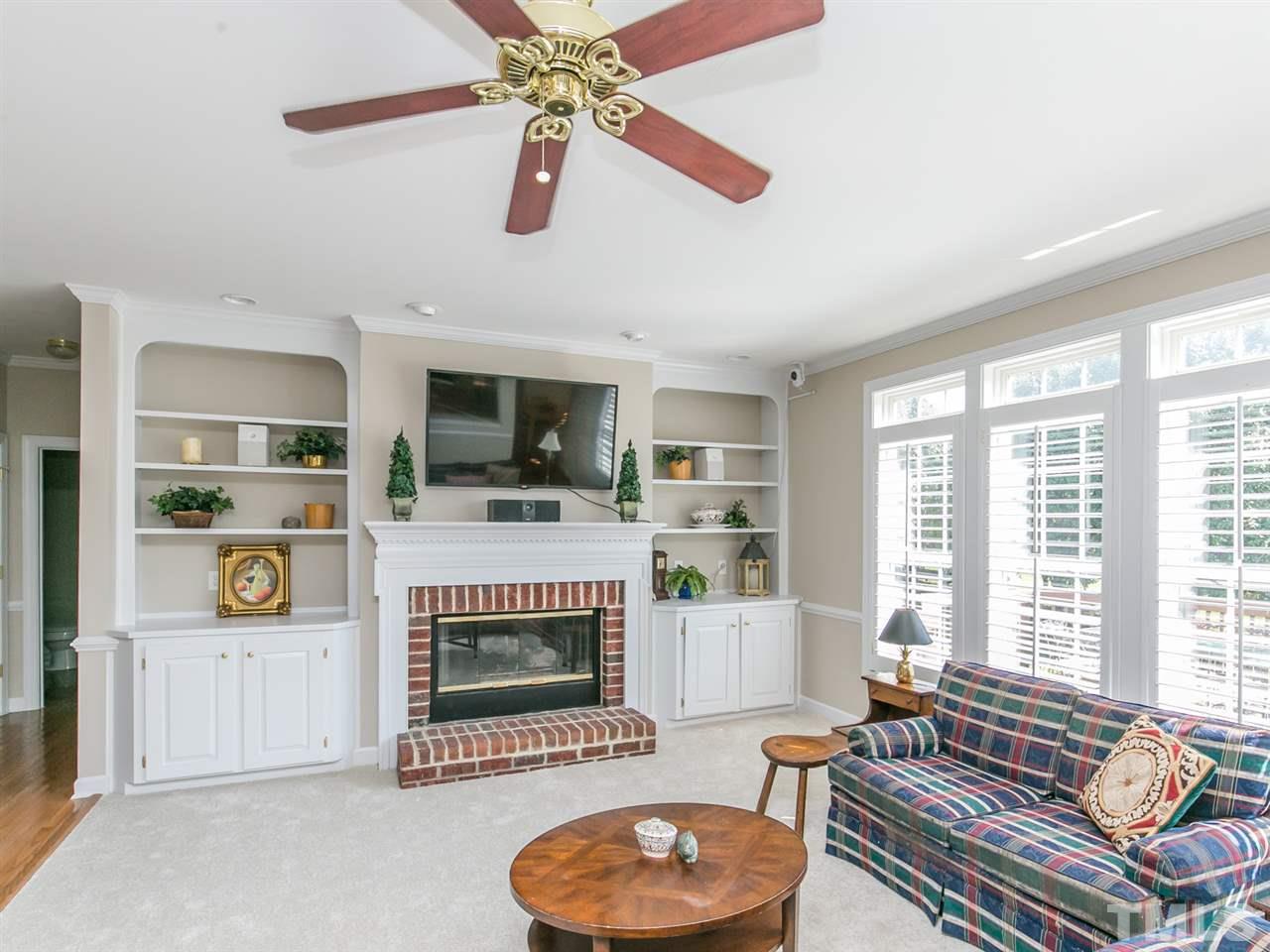 12416 Mayhurst Place Raleigh, NC 27614 - Photo 6 of 25 Built in Bookcases and Gas Fireplace in the Spacious Family Room