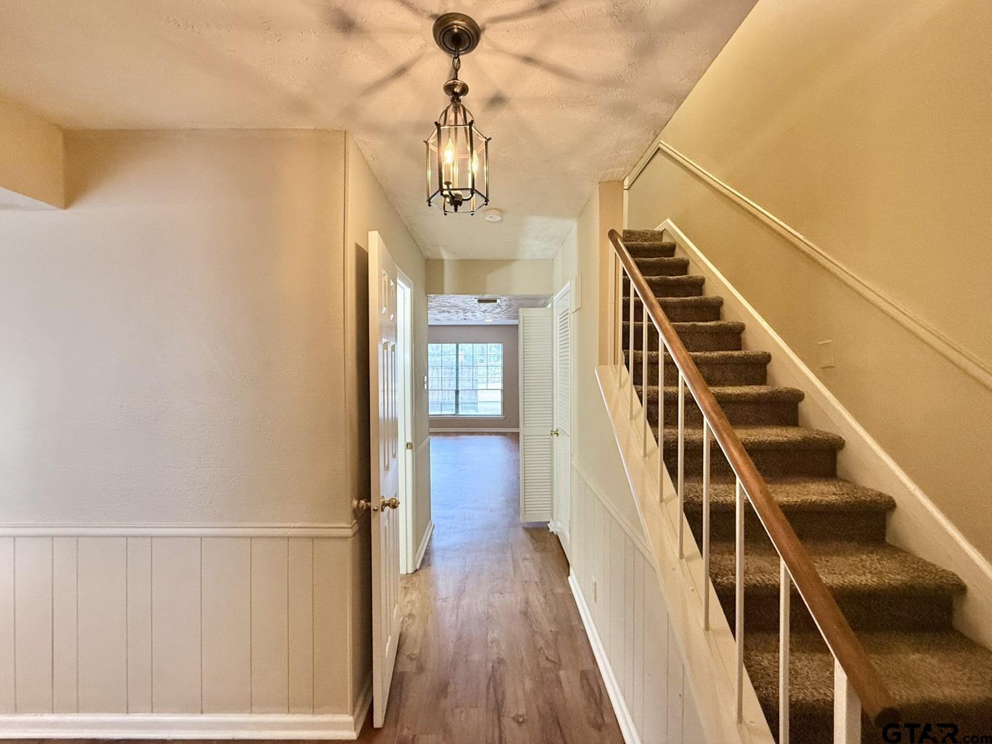 2510 Delmar Street Tyler, TX 75701 - Photo 1 of 18 a view of entryway and hall with wooden floor
