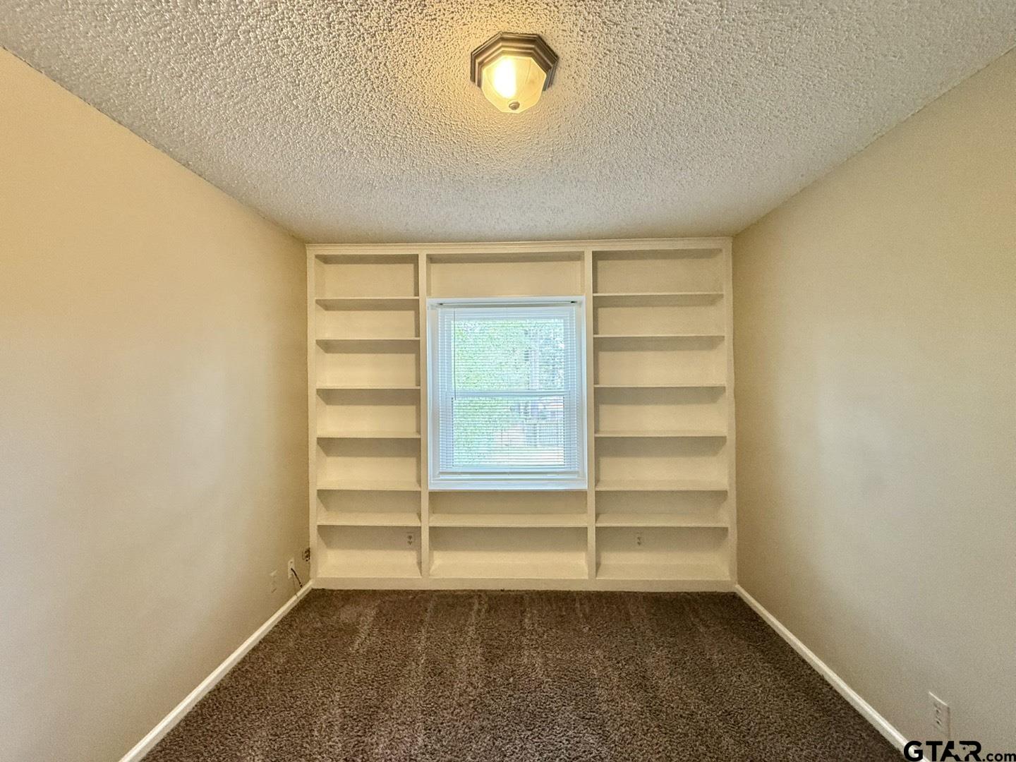 2510 Delmar Street Tyler, TX 75701 - Photo 15 of 18 a view of an empty room with a window