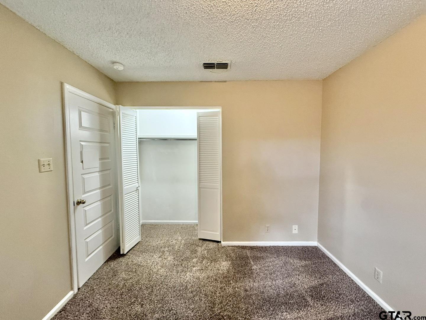2510 Delmar Street Tyler, TX 75701 - Photo 16 of 18 an empty room with closet