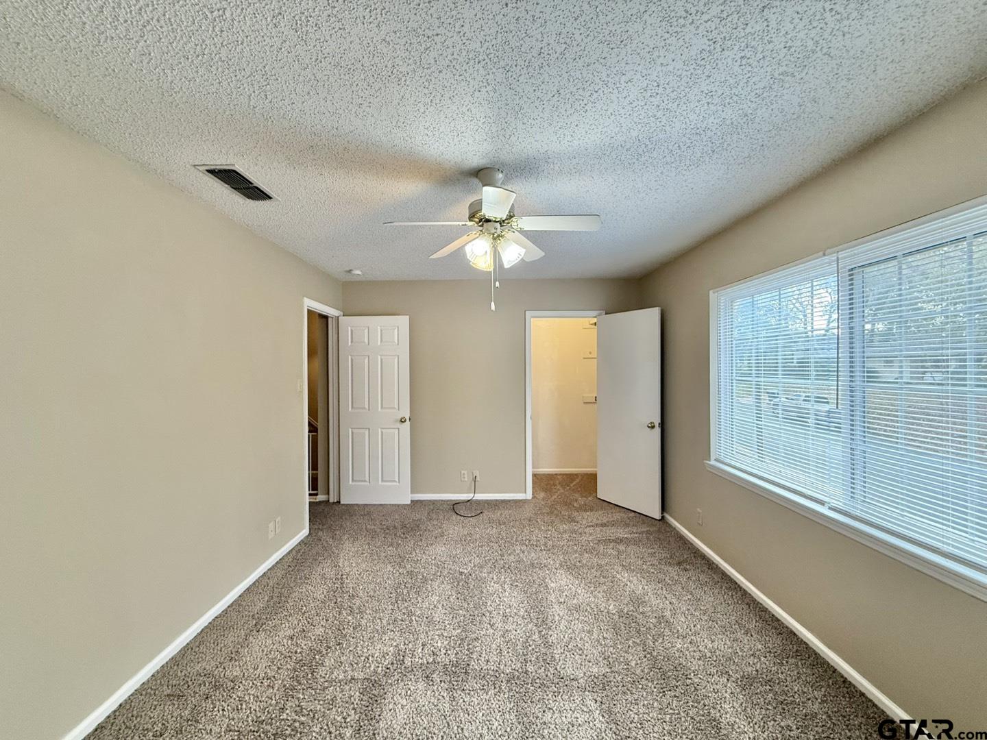 2510 Delmar Street Tyler, TX 75701 - Photo 8 of 18 a view of an empty room with a window
