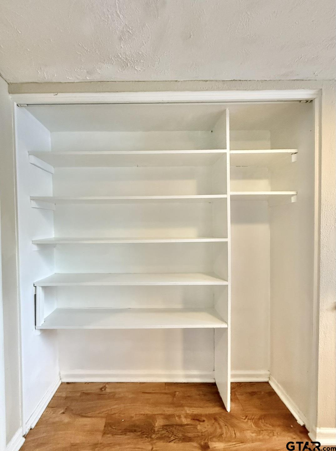 2510 Delmar Street Tyler, TX 75701 - Photo 10 of 18 a view of a room with empty racks