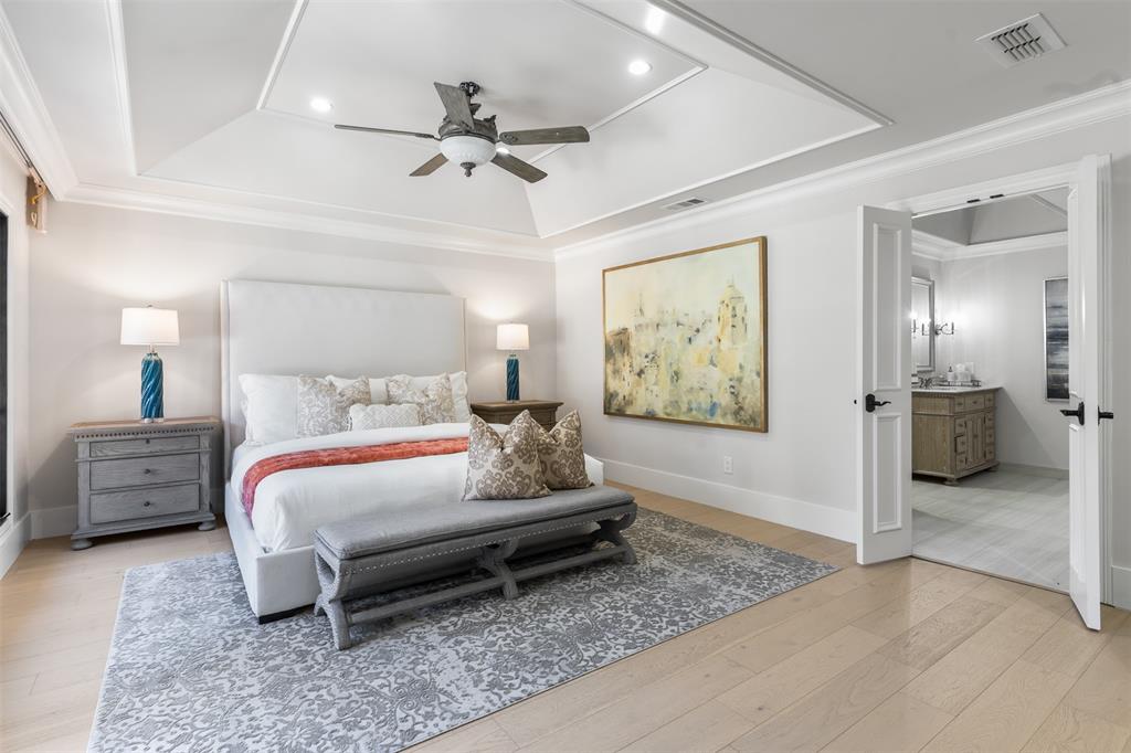 3922 Inwood Road Dallas, TX 75209 - Photo 13 of 35 a bedroom with furniture and a chandelier